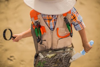 Boy Wearing Brown and Orange Jacket