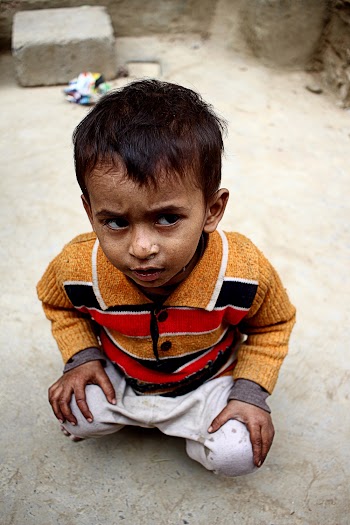 Boy Wearing Orange Jacket