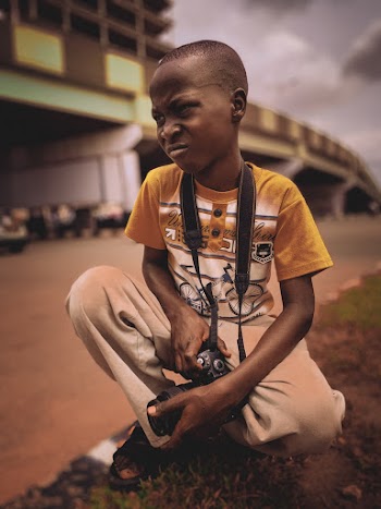 Boy Wearing Yellow and White Crew-neck T-shirt