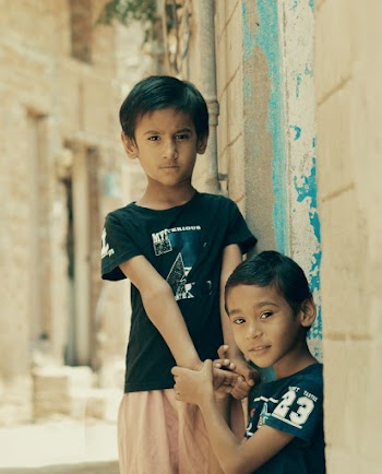 Boys Beside Wall