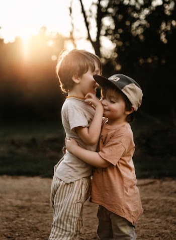Boys Hugging Each Other