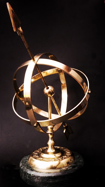 Brass-colored and Black Table Decor