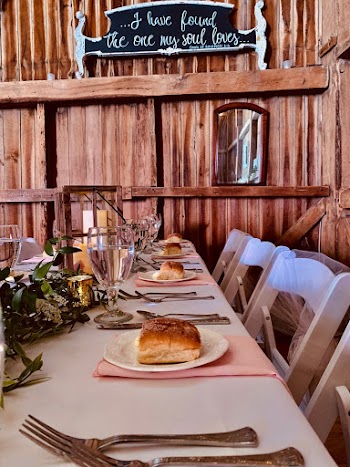 Breads on White Plates on Table