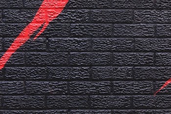 Brick Wall With Graphic Street Art