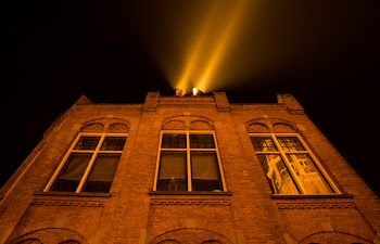 Bricked Building White Light on Rooftop