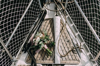 Bridal Bouquet and Wedding Rings on Deck