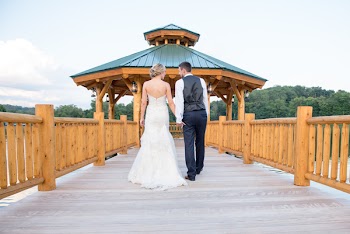 Bride And Groom Walking Towards Gazebo