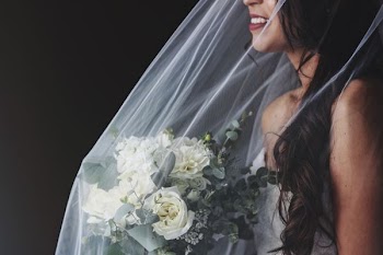 bride holding flower bouquet
