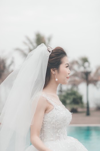 Bride wearing a white Wedding Gown