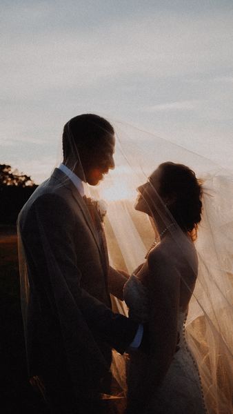 brides and groom looking each other