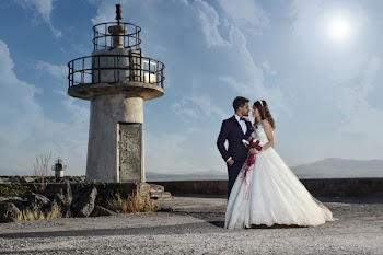Bridge and Groom Standing Close Toy Each Other Near Lighthouse