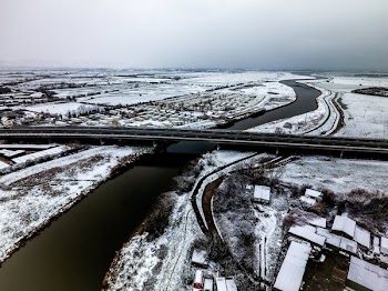 Bridge Over A River In Winter