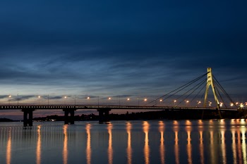 bridge over river at night