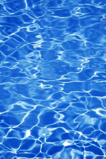 Bright blue pool water background