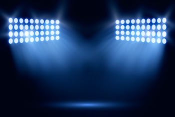 Bright realistic stadium lights Free Vector