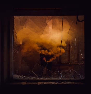 Broken window with some smoke