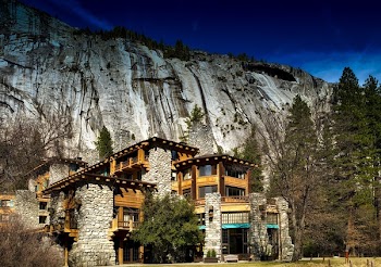 Brown 3-storey House Near Mountain