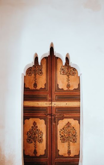 brown and beige wooden floral doors