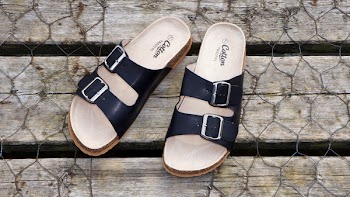 Brown-and-black Cotton Leather Sandals on Gray Metal Screen