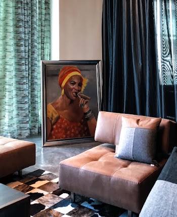 Brown and Black Sofa With Throw Pillows