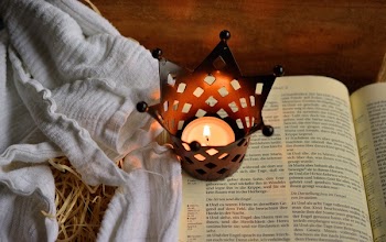 Brown and Black Tealight Candle Rack on Book