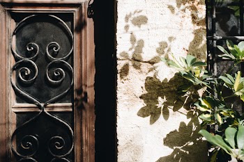 Brown And Black Wooden Window Pane