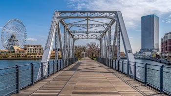 Brown and Gray Bridge Near Buildings