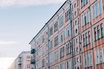 brown and gray concrete building at daytime