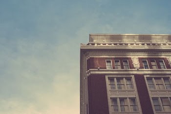 brown and gray concrete structure under blue sky