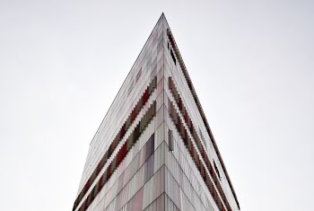 brown and gray high-rise building