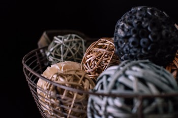 Brown and Gray Vine Balls on Brown Metal Rack