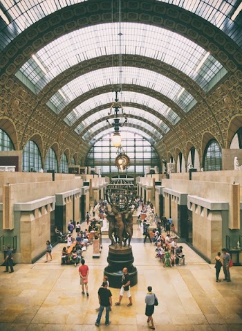 Brown and Grey Building With People Inside