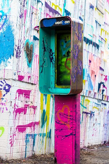 Brown and Pink Telephone Booth