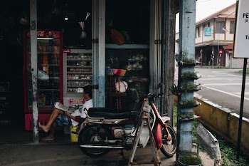 Brown and Red Underbone Motorcycle