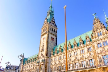 Brown and Teal Concrete Pointed Top Building