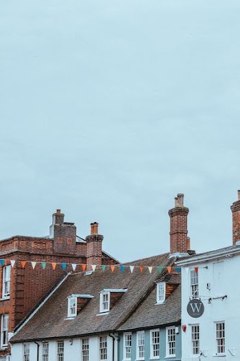 brown and white building at daytime
