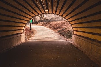 brown and white concrete tunnel