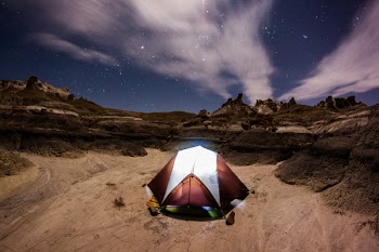 Brown and White Dome Tent at Nighttime