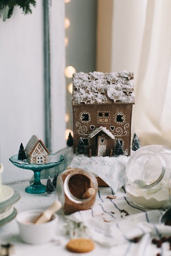 Brown and White House Miniature on White Towel