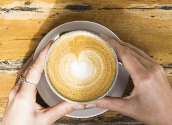 Brown and White Latte on White Ceramic Cup