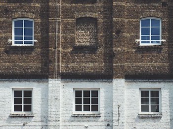 brown and white painted building