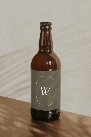 Brown beer bottle on wooden | Free PSD Mockup - rawpixel