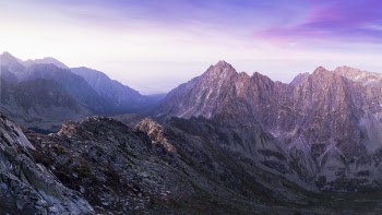 Brown Black and White Mountain Under White and Blue Cloudy Sky