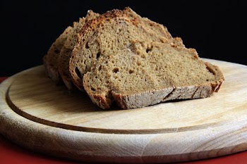 Brown Bread on Round Wooden Tray