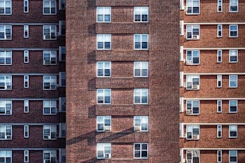 brown brick high-rise building