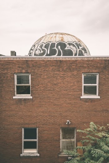 Brown Brick Walled Building