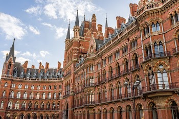 Brown Building during Sunny Blue Cloudy Sky