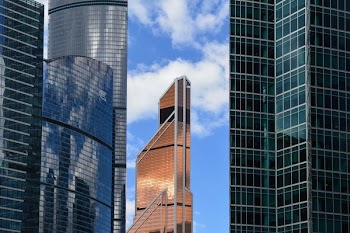 Brown Building Near Gray Building
