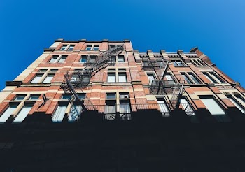 brown building under sunny sky