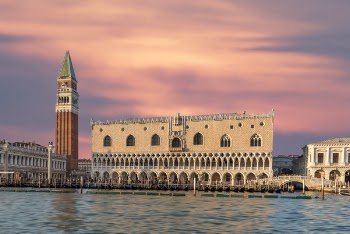 Brown Building With Body of Water